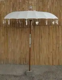 Bali umbrella, creme with metal coins and silver hearts hanging around the edge, ø 190 cm and 250cm height 